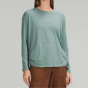 BRAND NEW WITH TAG lululemon long sleeve top with side cinch, size 6